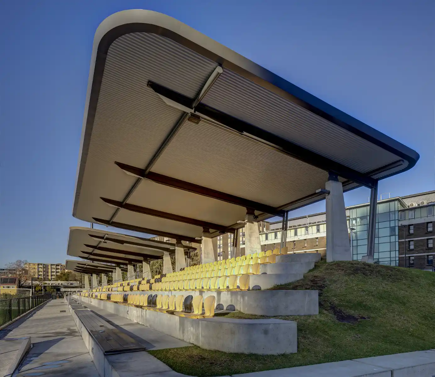 ARCPANEL insulated roof panels over seating at Moya Dodd Grandstand UNSW