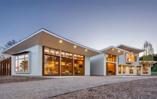 Architectural roofing on Braidwood residence with large roof spans and overhangs