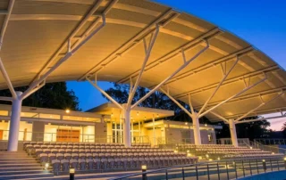 Curved ARCPANEL insulated roof panels creating an architectural canopy