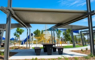 Fire rated insulated roofing over a community recreation area