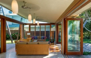 Fire rated insulated roofing with finished ceiling over a residential living area