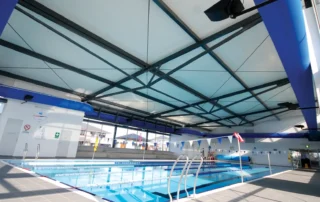 DeltaMax corrosion resistant insulated roofing over an indoor swimming pool