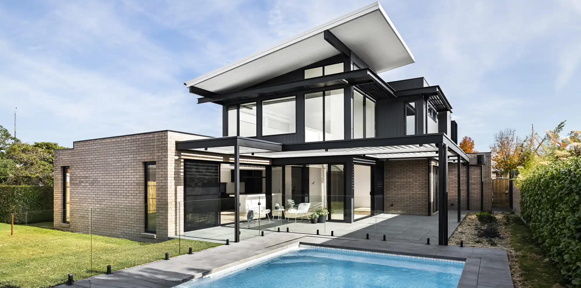 DeltaMax Insulated Roofing for Residential Applications DeltaMax insulated roofing on a contemporary home with swimming pool